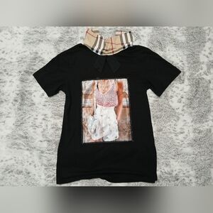 Stylish Black Graphic Tee with Plaid Accent